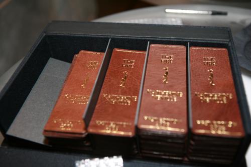 Custom designed “1st Edition” leather bookmarks by Donald Kobetsky, presented with first editions of THE FIRE