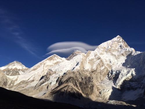 14 - Everest (mountain in the center, back, with the clouds gliding over it)