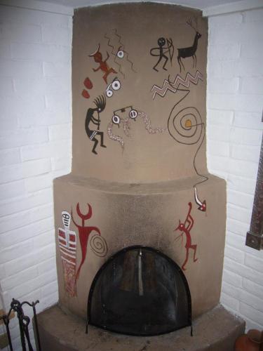 Santa Fe Kiva Fireplace - The Story of the Water Jar Boy 