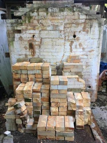 Bricks are kept in organized piles 